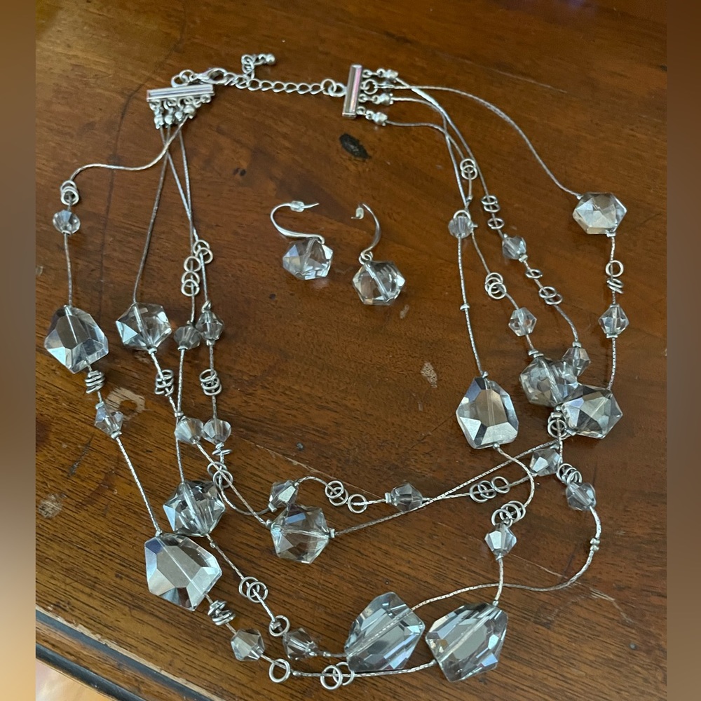 A little bit of sparkle to your wardrobe.  18” length with matching earrings.